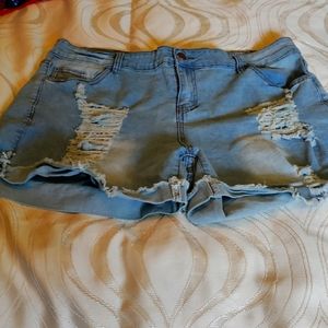 Roswear distressed XXL denim shorts.